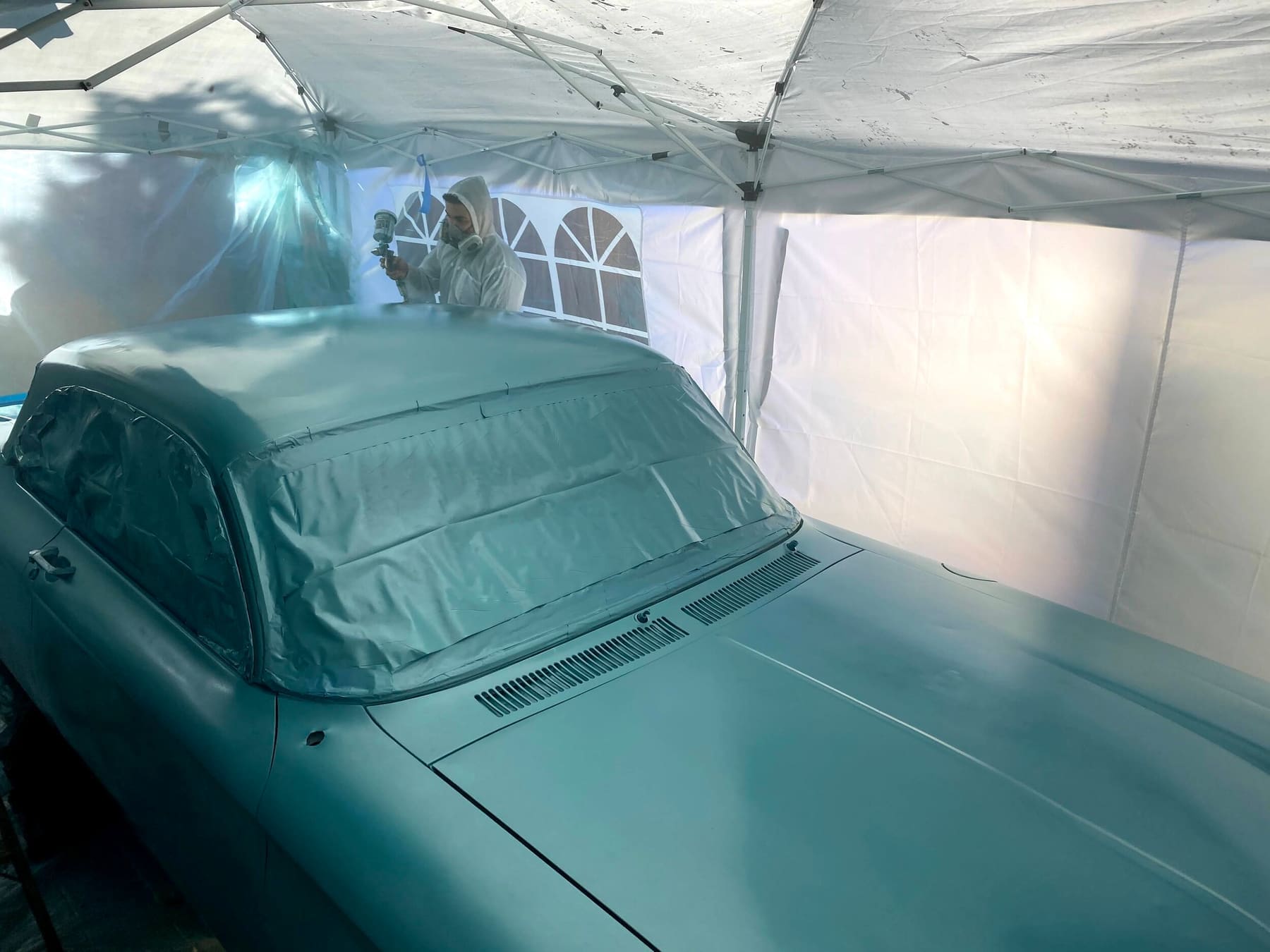 Car masked and prepped for painting